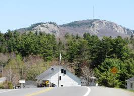 photo of a road in front of a mountain in Clifton Maine